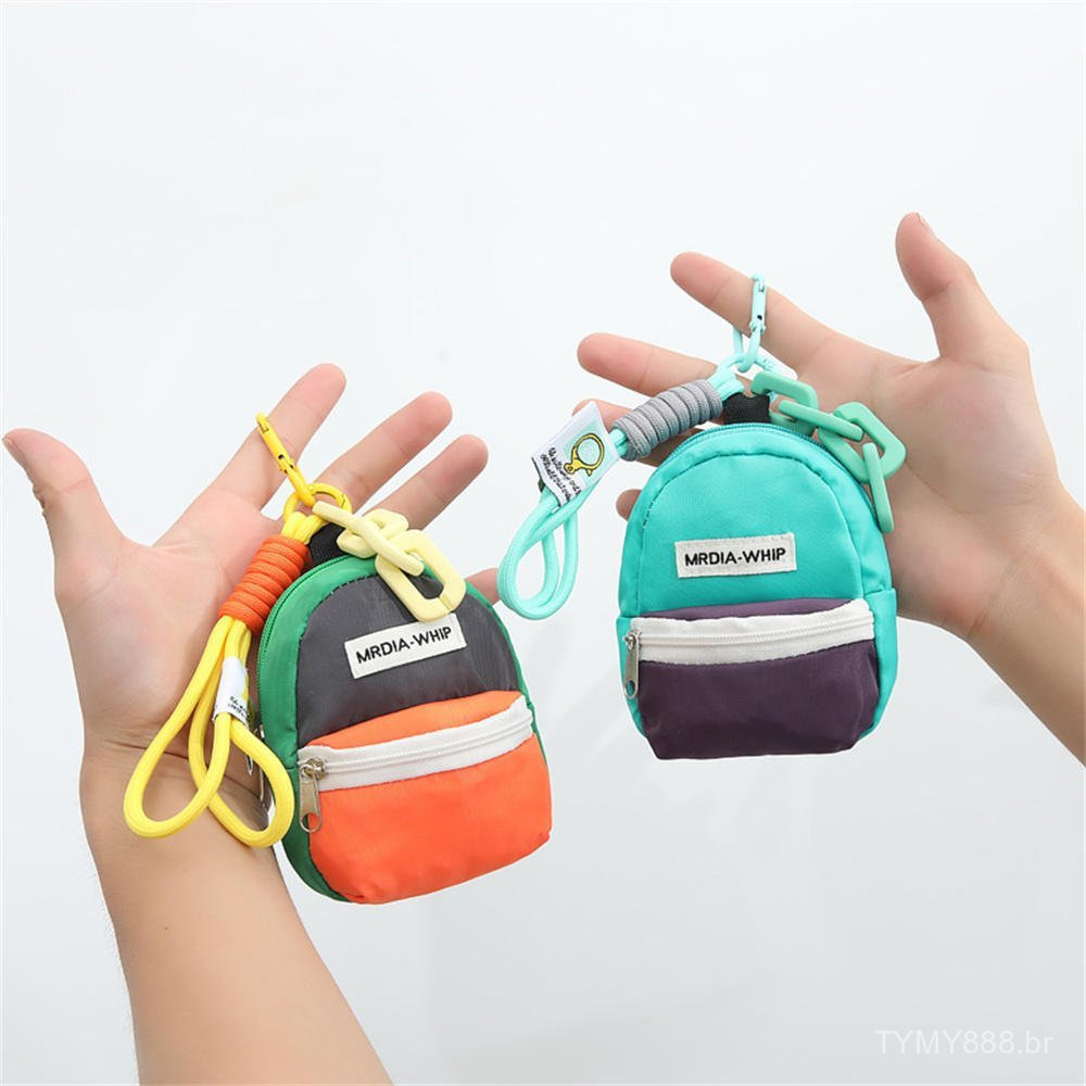 1 Mini Mochila Chaveiro Bolsa Pequena Porta-Moedas Carteira com Zíper Cor Macaron Unissex Airpods Cosméticos