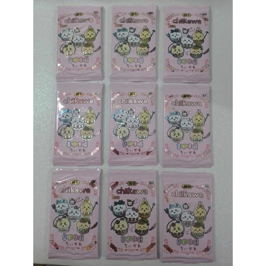 Nove boosters (pacotinhos de cartas) oficiais de Chiikawa da marca KABAO