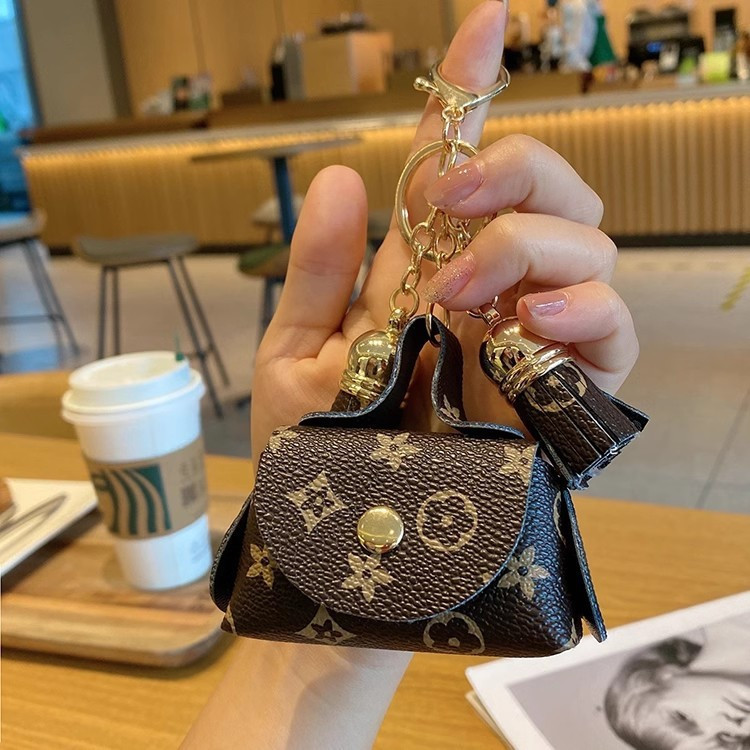 Bonito Mini couro pequeno saco moeda bolsa fone de ouvido saco de armazenamento pingente de cartão chave saco chave