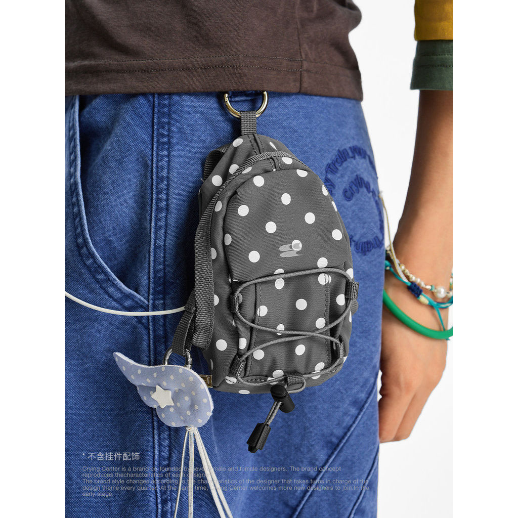 Chorandocenter Polka Dot saco de escola forma Mini versão fone de ouvido saco de armazenamento portátil pingente moeda b