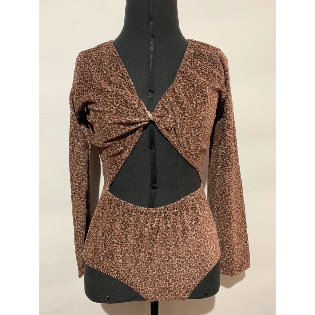 Body animal print peluciado